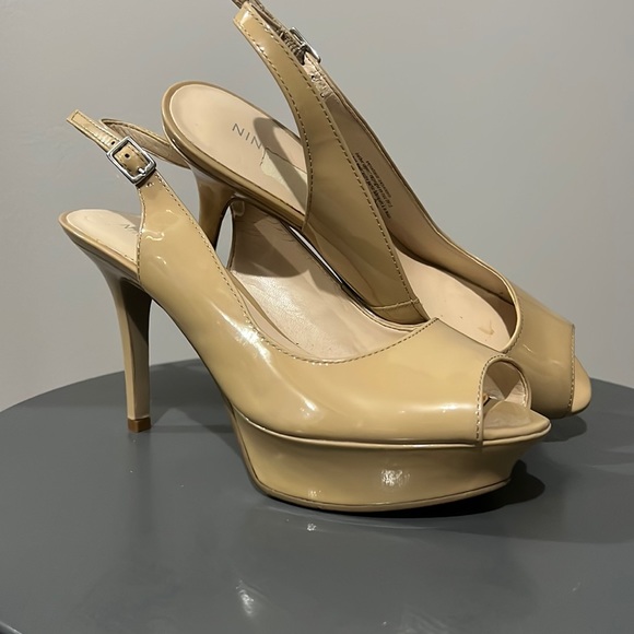 Nine West Bone Colour patent leather sling back heel.